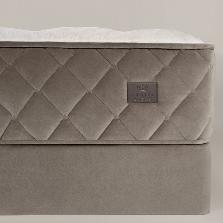 Side profile view of the 13-inch Chattam and Wells Lismore mattress showcasing the velvet border.