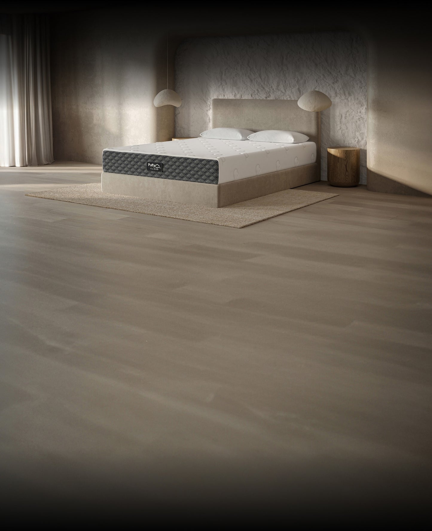 Three-quarter side angle view of the 10-inch Puffy Cloud mattress highlighting the signature grip base cover layout.