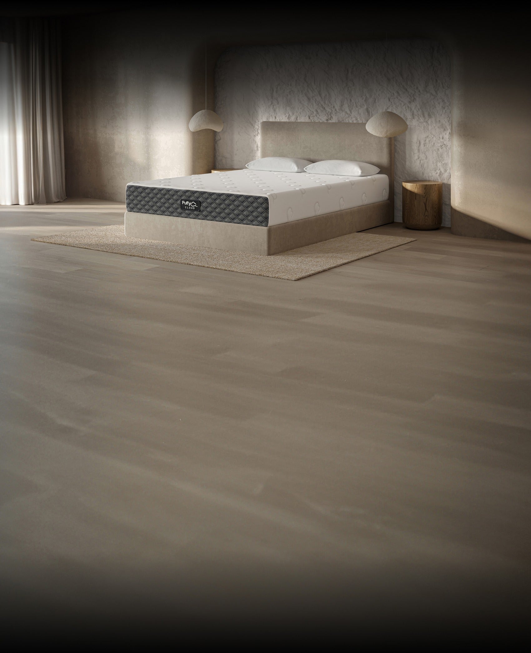 Three-quarter side angle view of the 10-inch Puffy Cloud mattress highlighting the signature grip base cover layout.