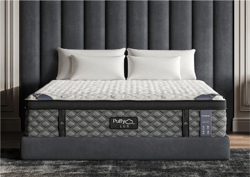 The Puffy Lux Hybrid memory foam mattress displayed straight-on in our San Diego showroom.